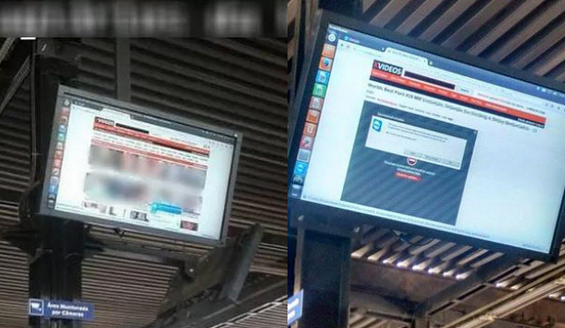 Layar monitor di terminal Boqueirao, Curitiba, Brasil yang menampilkan video porno