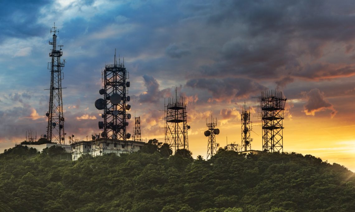 Silhouette Antenna towe with sunset background