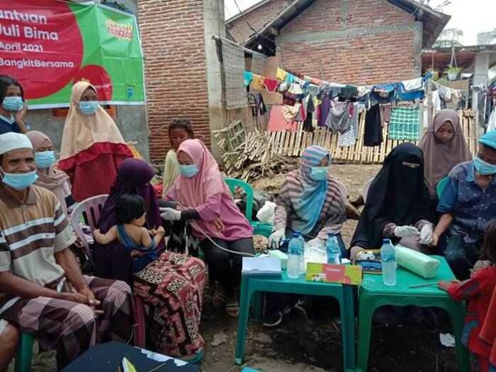 Indosat Ooredoo Banjir Bandang NTT Bantuan Indosat Ooredoo Korban Banjir NTT NTB