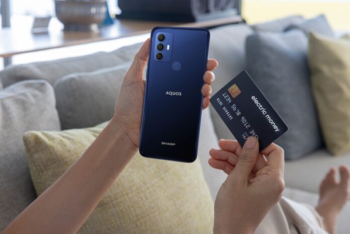 A,Woman,Shopping,Online,On,Her,Sofa,At,Home,With Spesifikasi Harga Sharp Aquos V6 Plus Indonesia