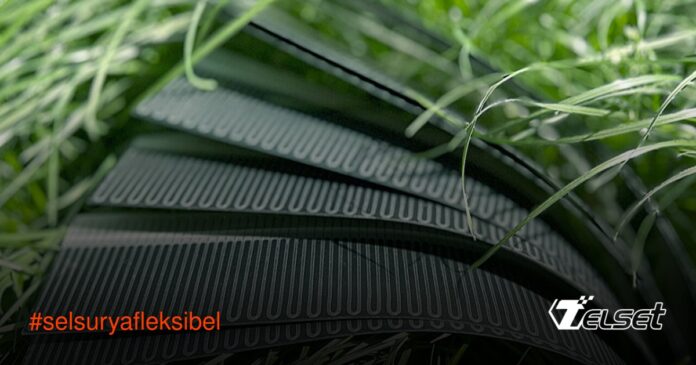 Sel Surya Fleksibel Tembus Efisiensi 24,6%, Tahan 3.000 Tekukan Ilustrasi sel surya fleksibel perovskite/CIGS yang sedang ditekuk