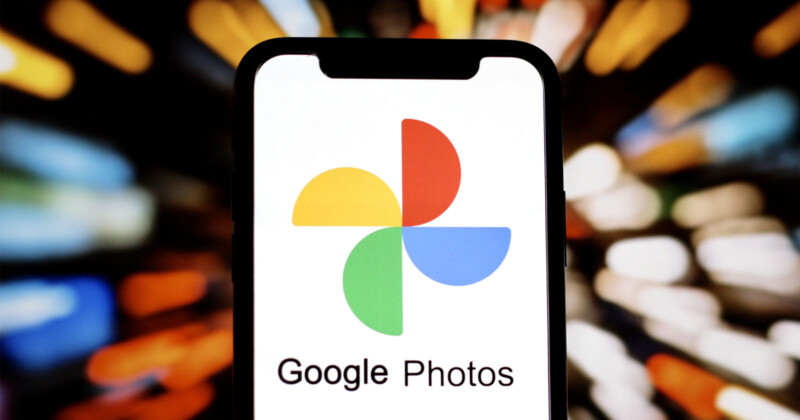 A smartphone displays the Google Photos logo and app name on its screen, with a colorful, blurred background of lights.