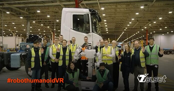 Robot humanoid VR sedang bekerja di pabrik truk Leyland