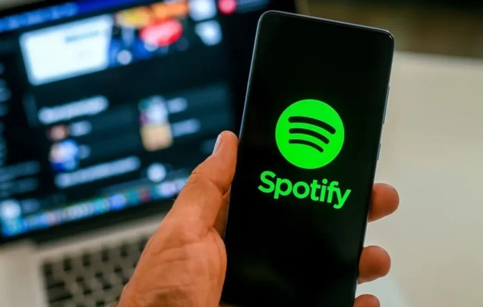 image-1751595216564-9844.webp Ilustrasi layanan streaming musik dan podcast Spotify