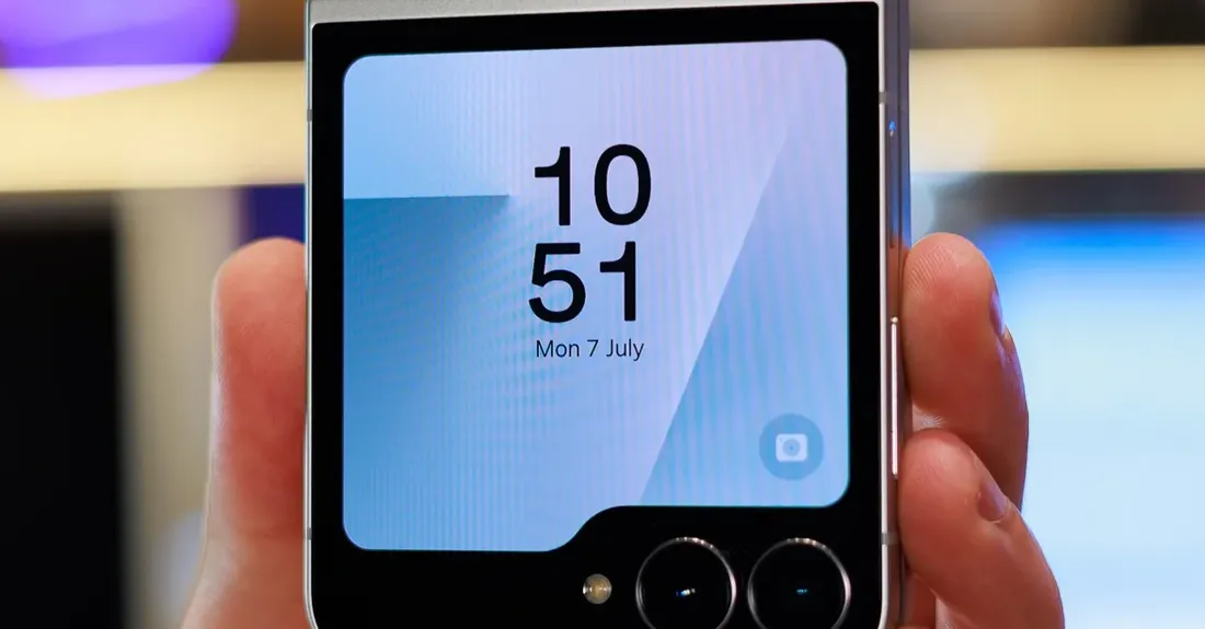 A photo of a Galaxy Z Flip 7 FE held in a hand.