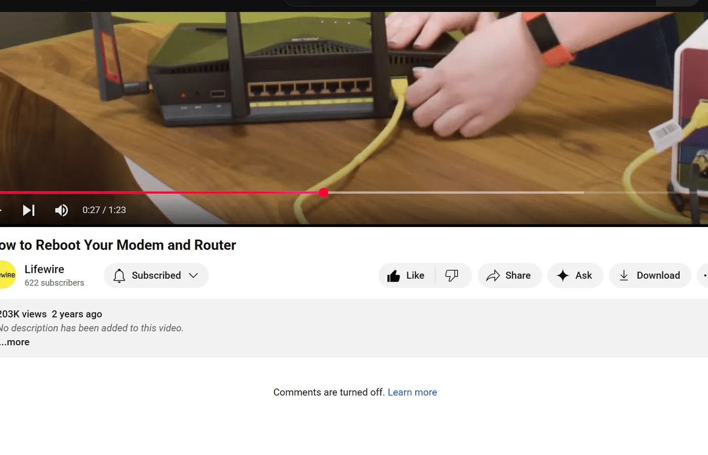 A YouTube video with the Download button visible